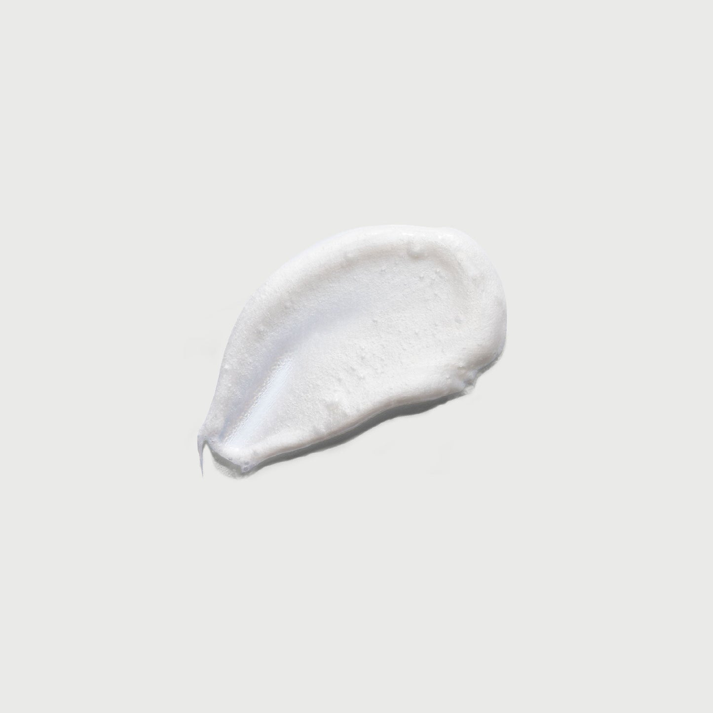 the-smoother-glycolic-acid-exfoliating-body-wash-j1 NATR-40002-Swatch-The-Smoother-Glycolic-Acid-Exfoliating-Body-Wash-bonebkgd.jpg