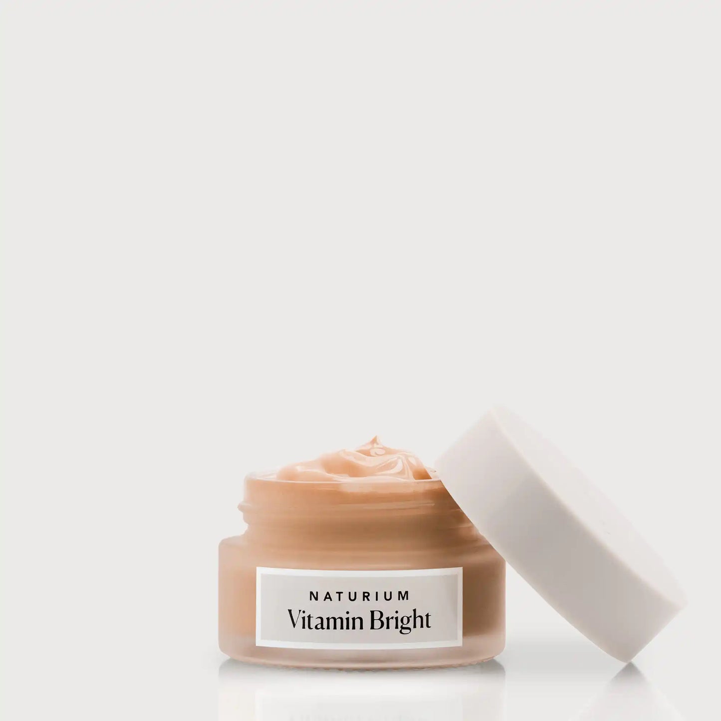vitamin-bright-illuminating-eye-cream-h9 NATR-VitaminBright_DEEP_Primary_front_openjar_bone.webp