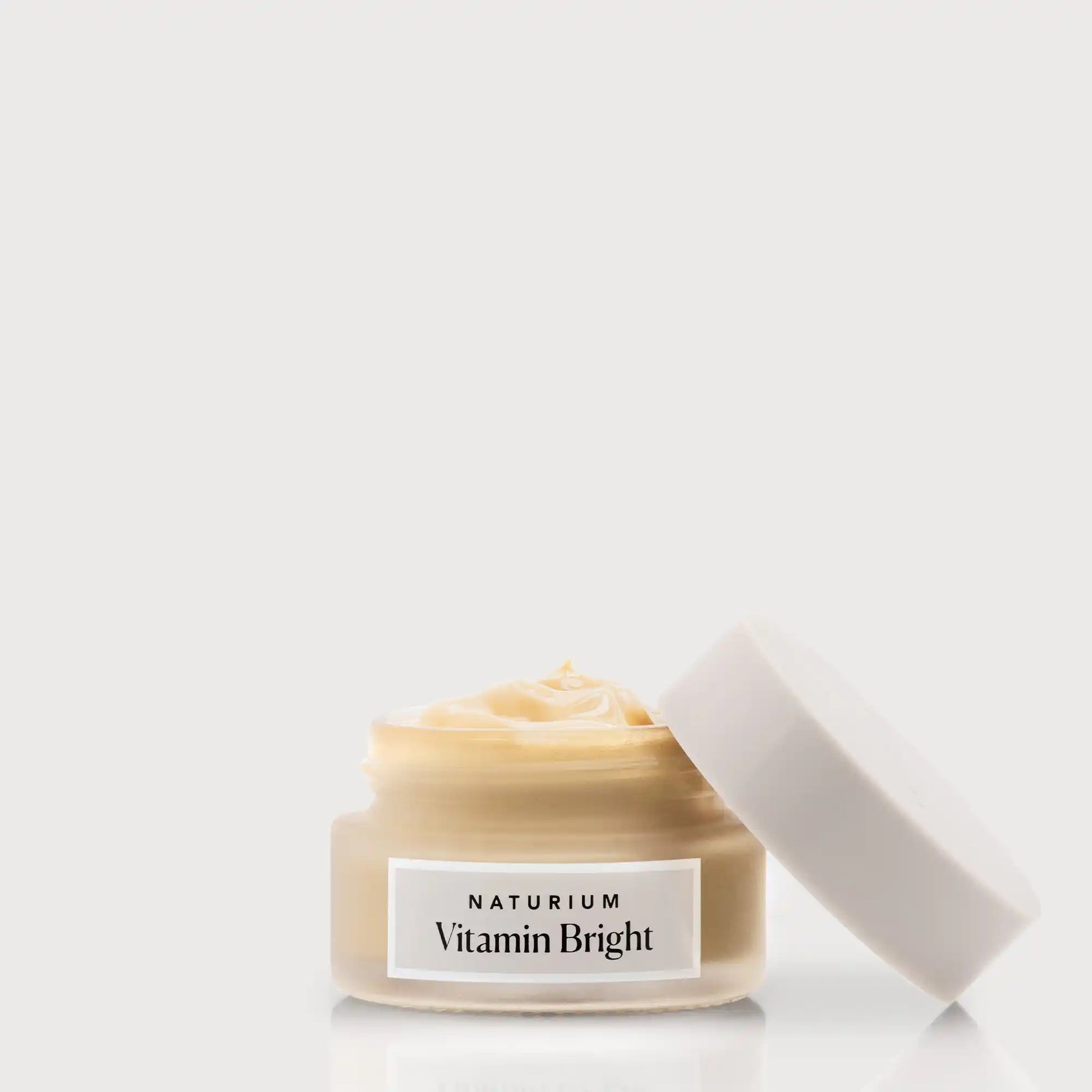 vitamin-bright-illuminating-eye-cream-h9 NATR-VitaminBright_LIGHT_Primary_front_openjar_bone.webp